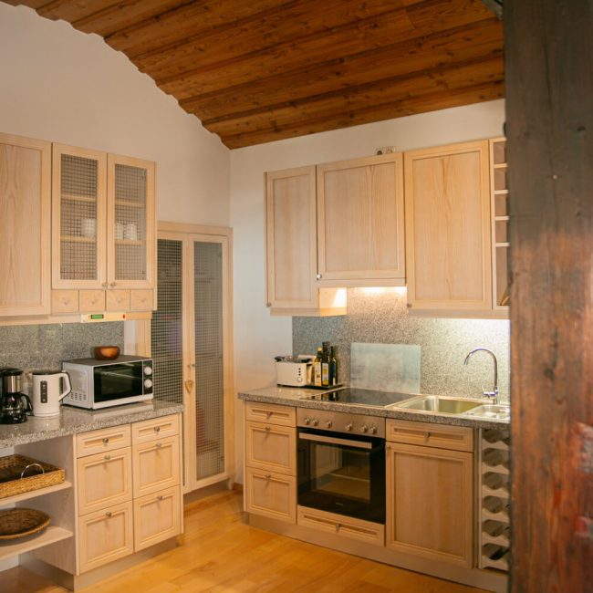 Foto der Küche im Ferienhaus der Kollnbergmühle